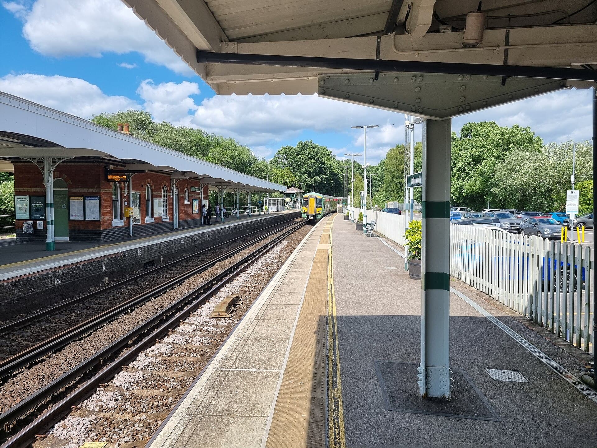 The platform and station buildings at Pulborough railway station, West Sussex.