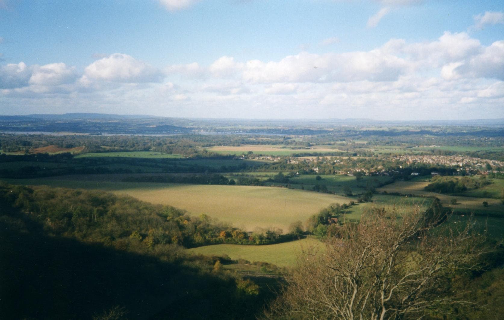 Storrington seen from Kithurst Hill, with the West Sussex weald beyond.